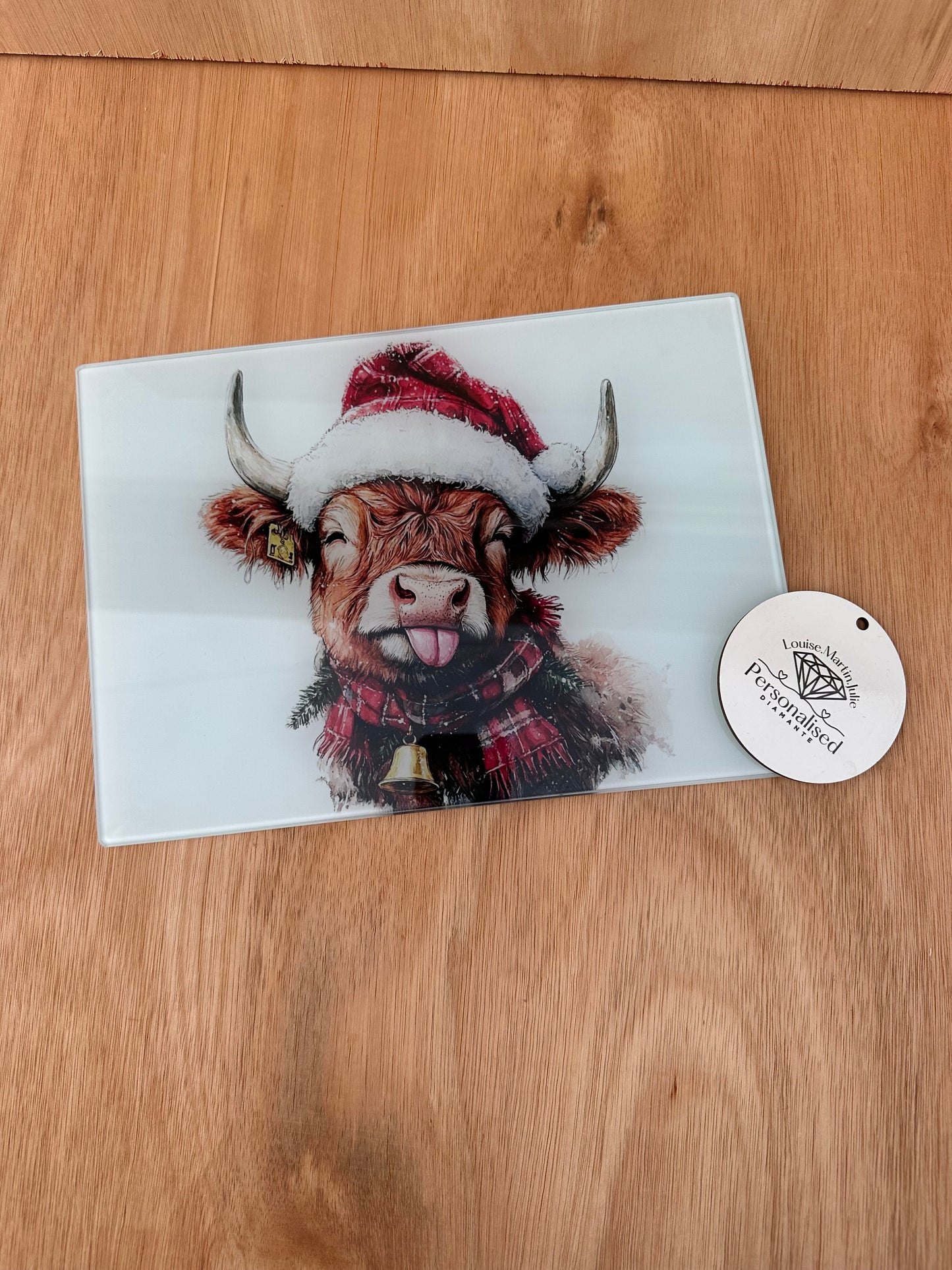 Christmas Highland cow A4 chopping board ￼