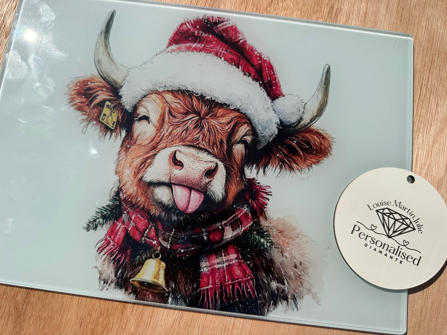 Christmas Highland cow A4 chopping board ￼