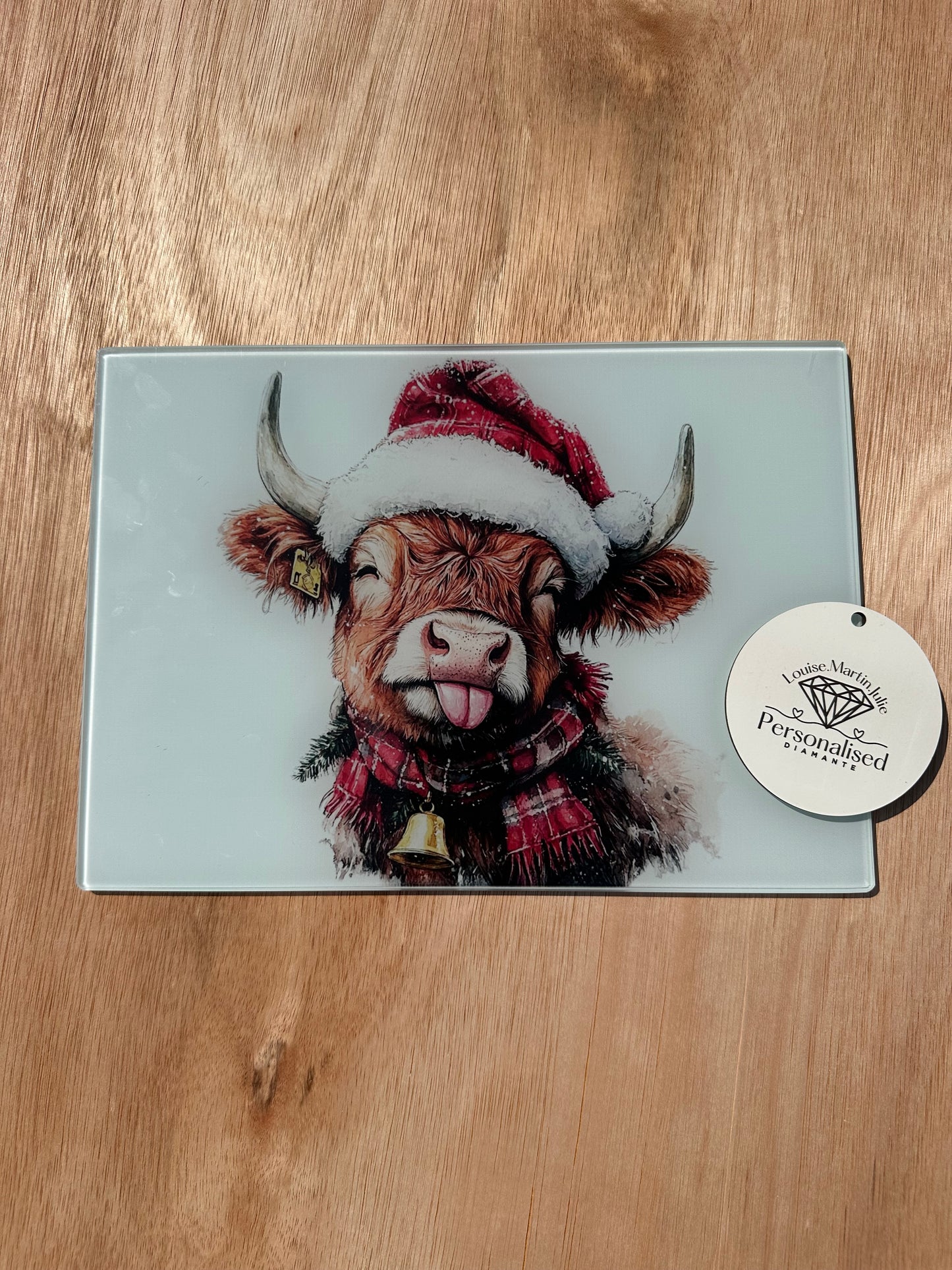 Christmas Highland cow A4 chopping board ￼