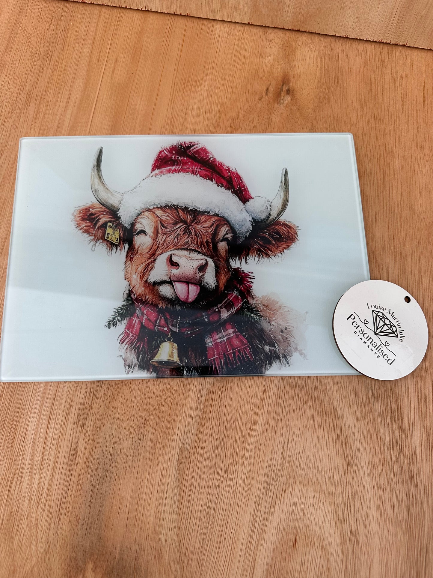 Christmas Highland cow A4 chopping board ￼