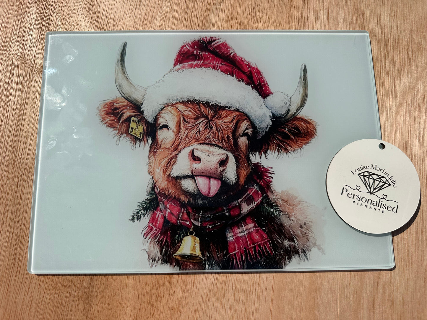 Christmas Highland cow A4 chopping board ￼