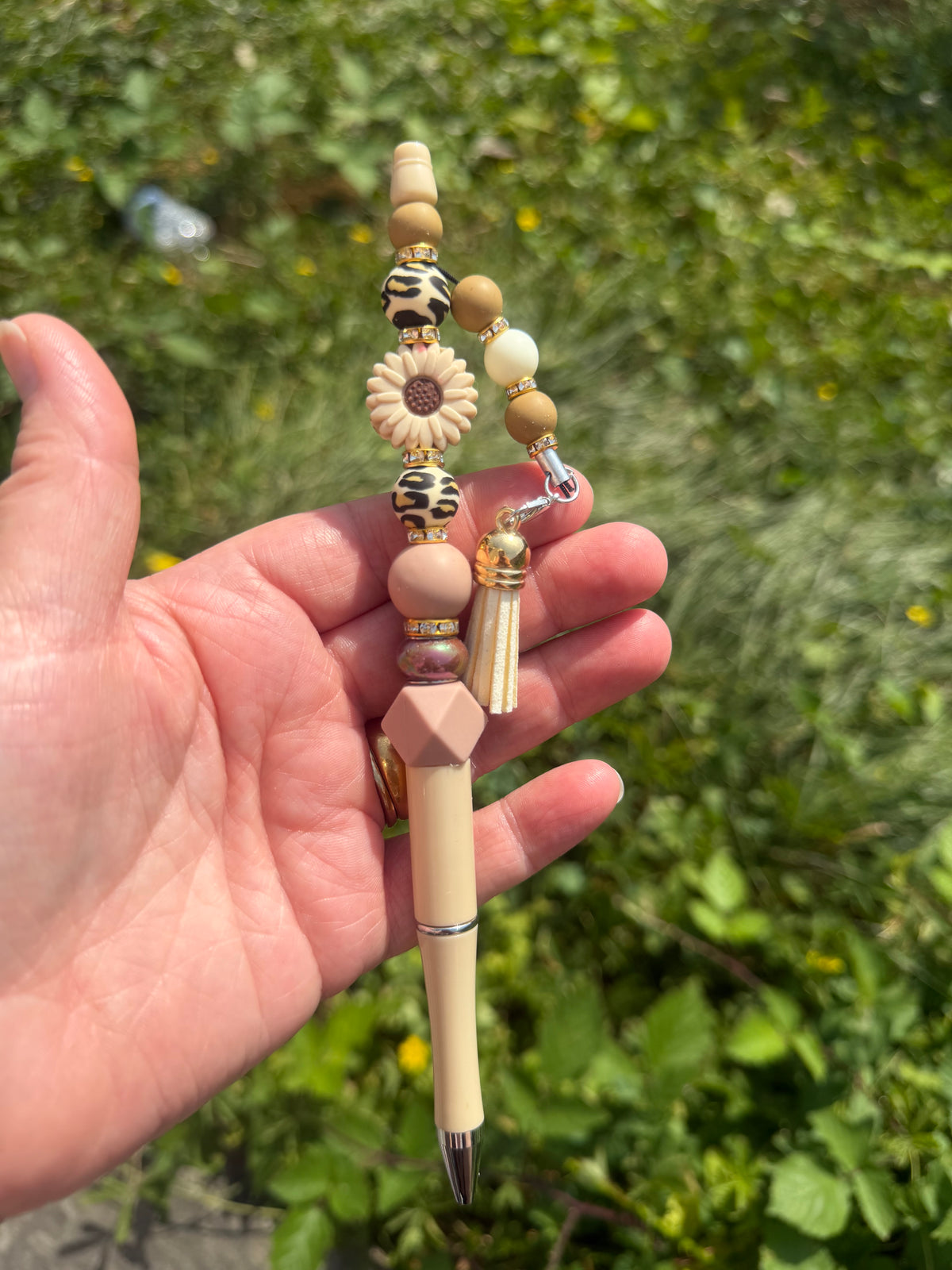 Large bead pen flower beige and browns in colour